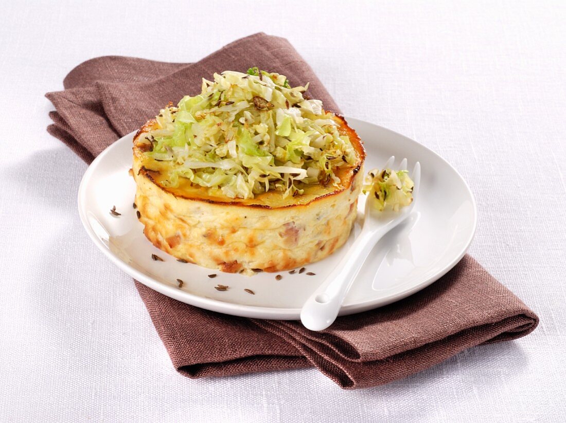 Ricotta flan with caraway and cabbage