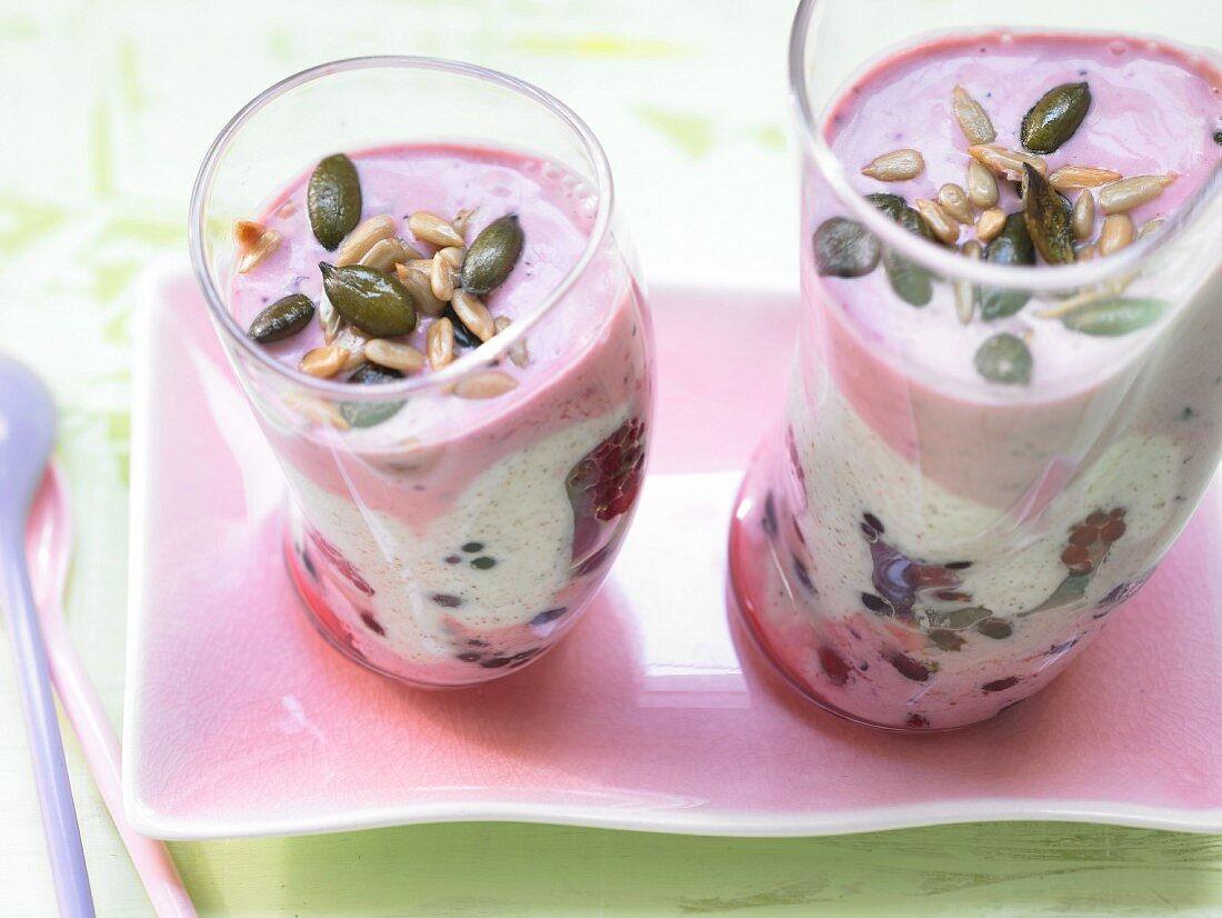 Layered berry and yoghurt dessert with mixed seeds