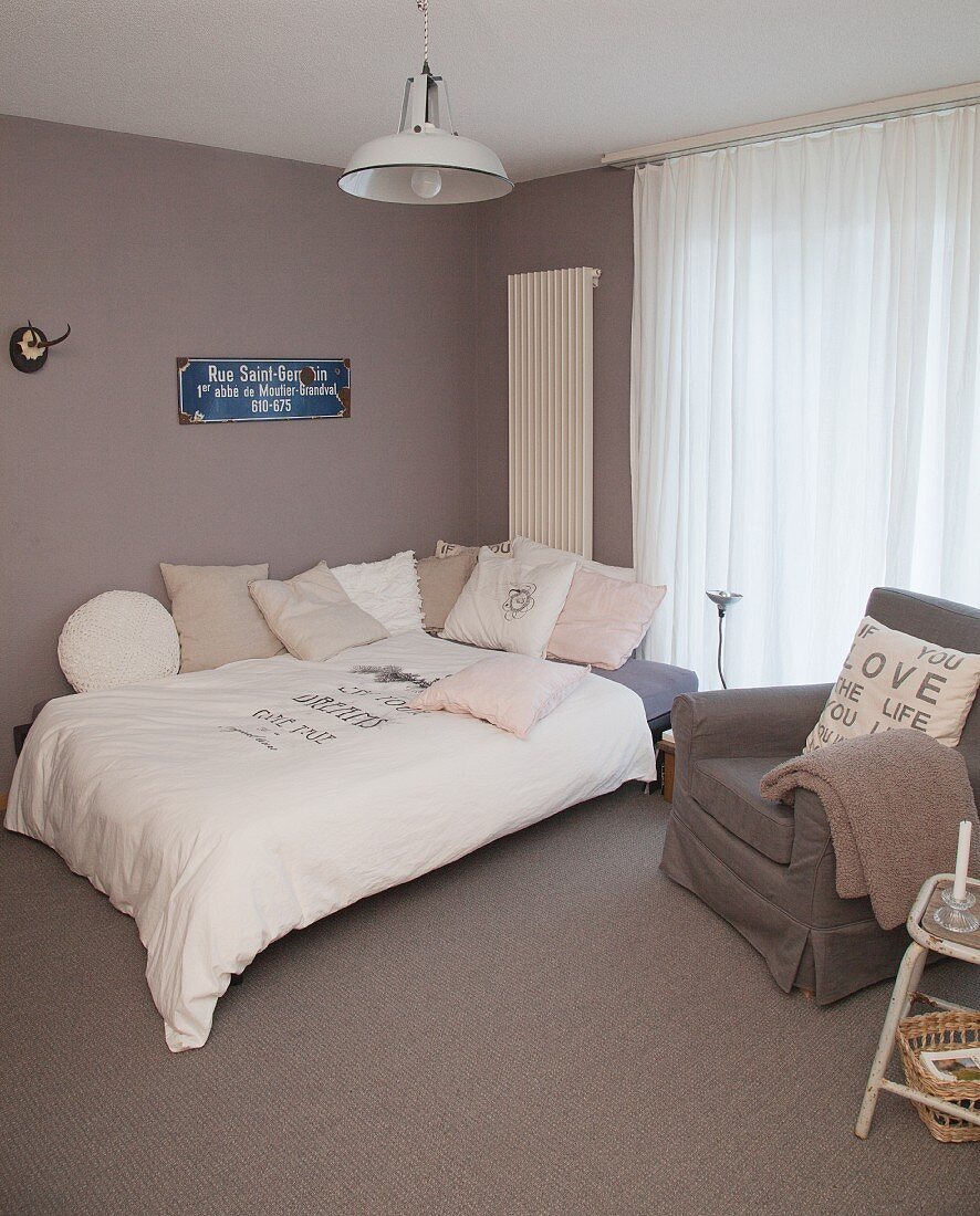 Vintage accessories in bedroom in muted colours