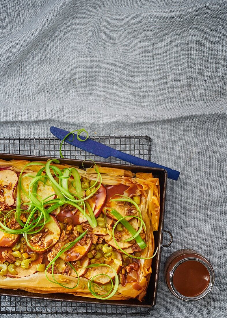 A caramelised celery and apple tart with nuts