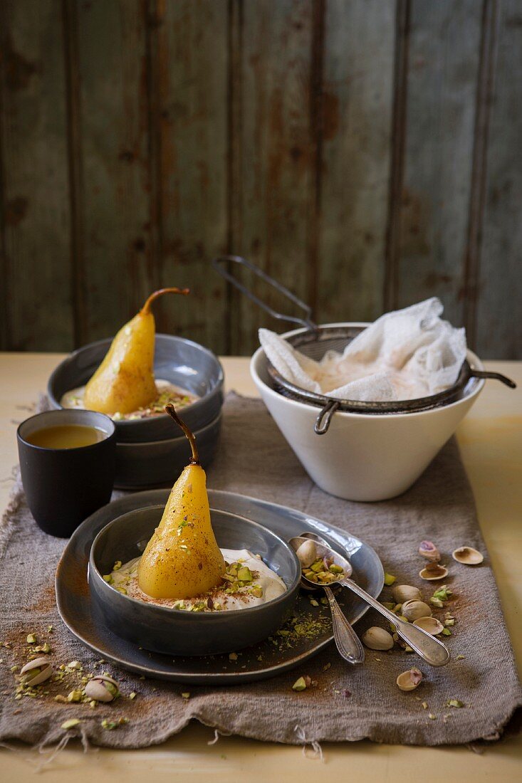 Sweet labneh with poached pears and pistachios