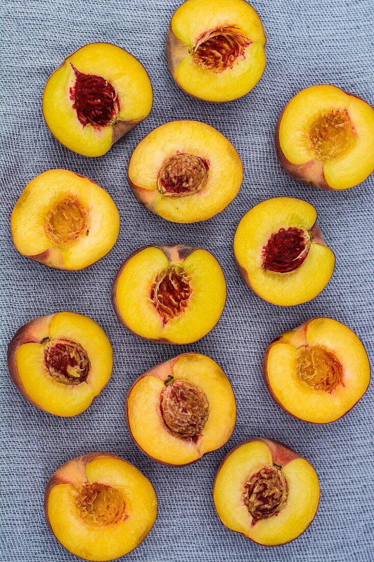 Several nectarine halves (seen from above)