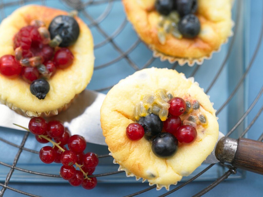 Passion fruit muffins with quark and fresh berries