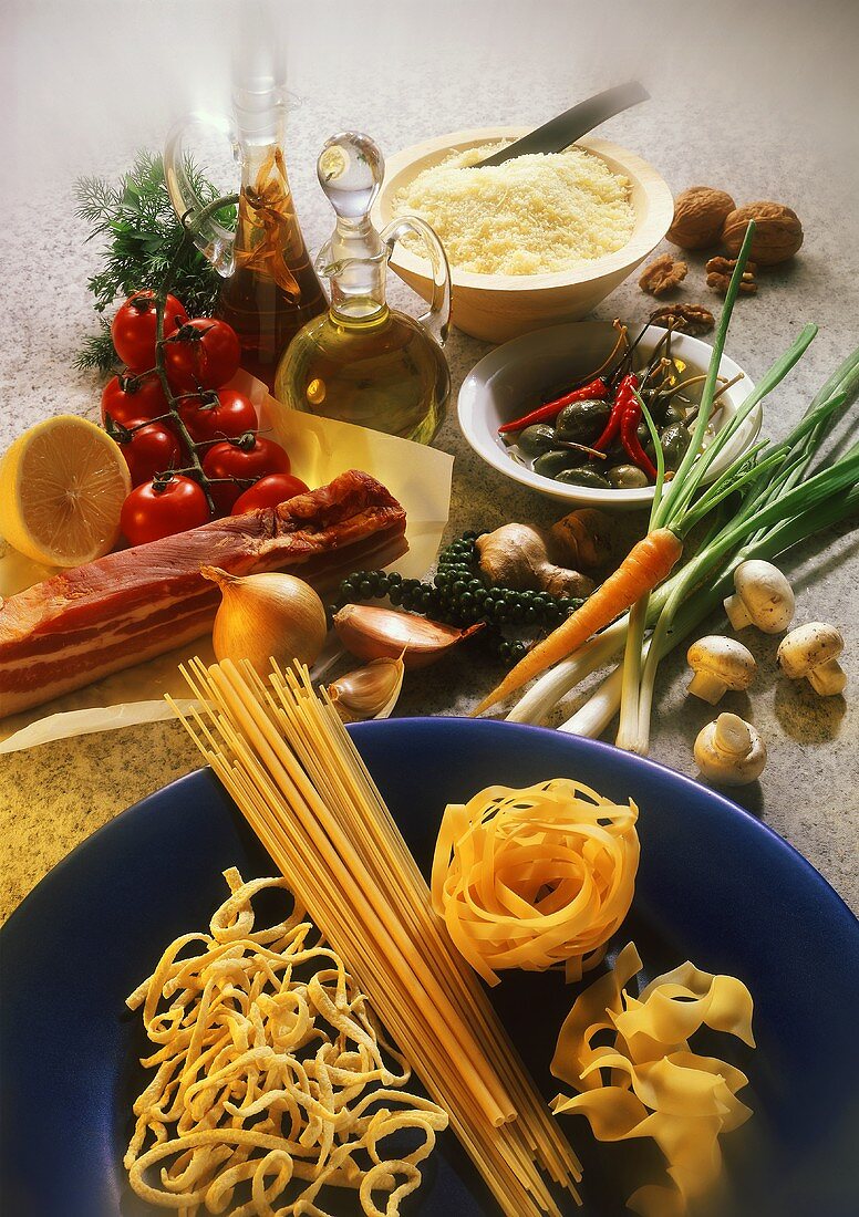 Assorted Pasta Still Life with Ingredients for Sauce