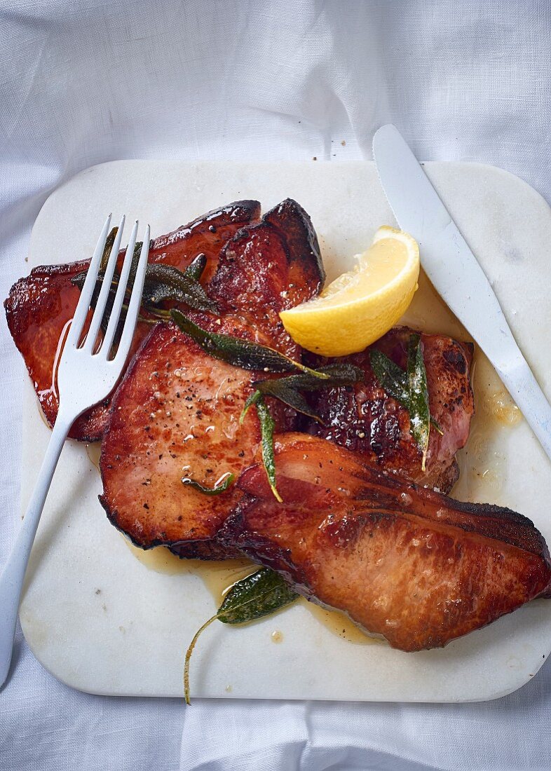 Pan-fried smoked pork chops with sage butter