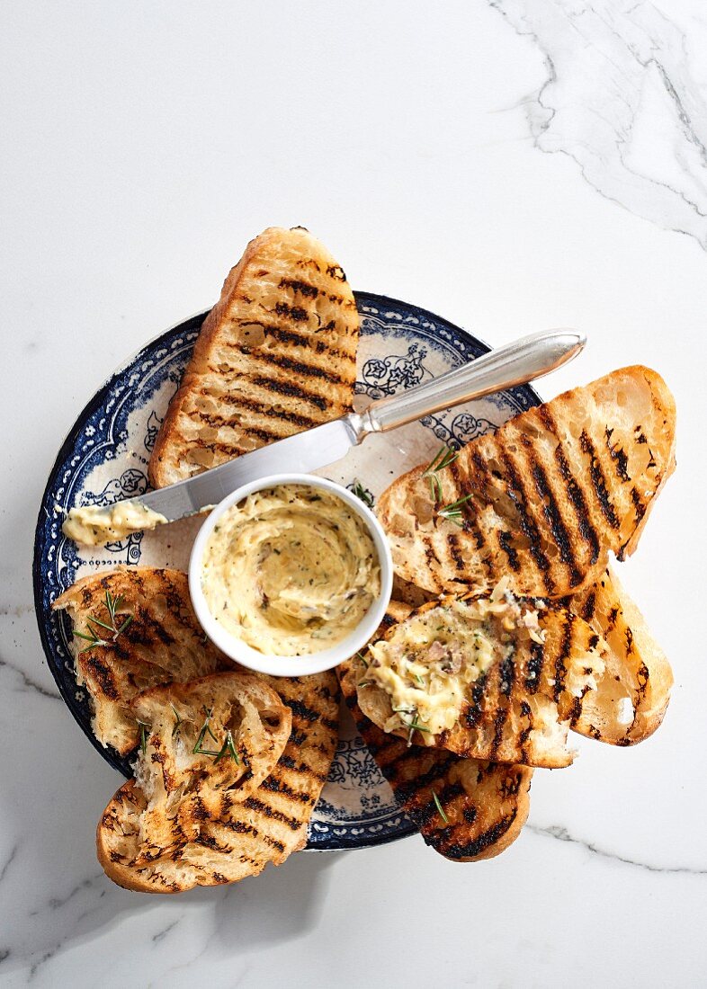 Toasted bread with anchovy, rosemary and Parmesan butter