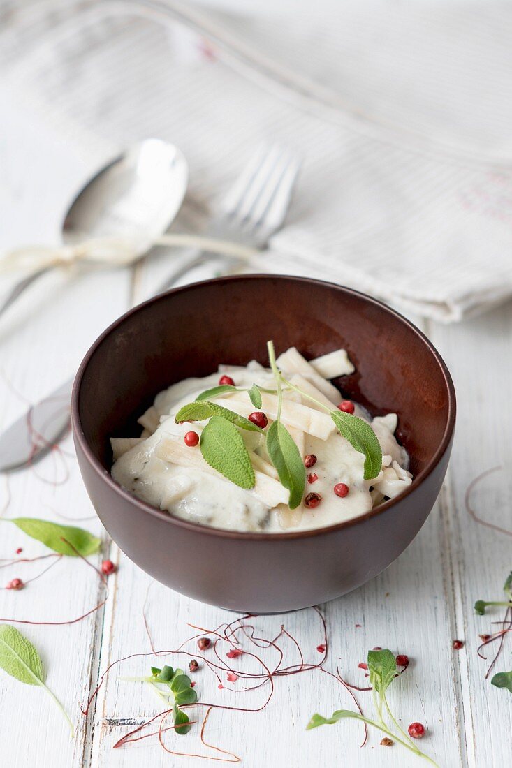 Sage and cream cheese sauce with pasta and pink peppercorns