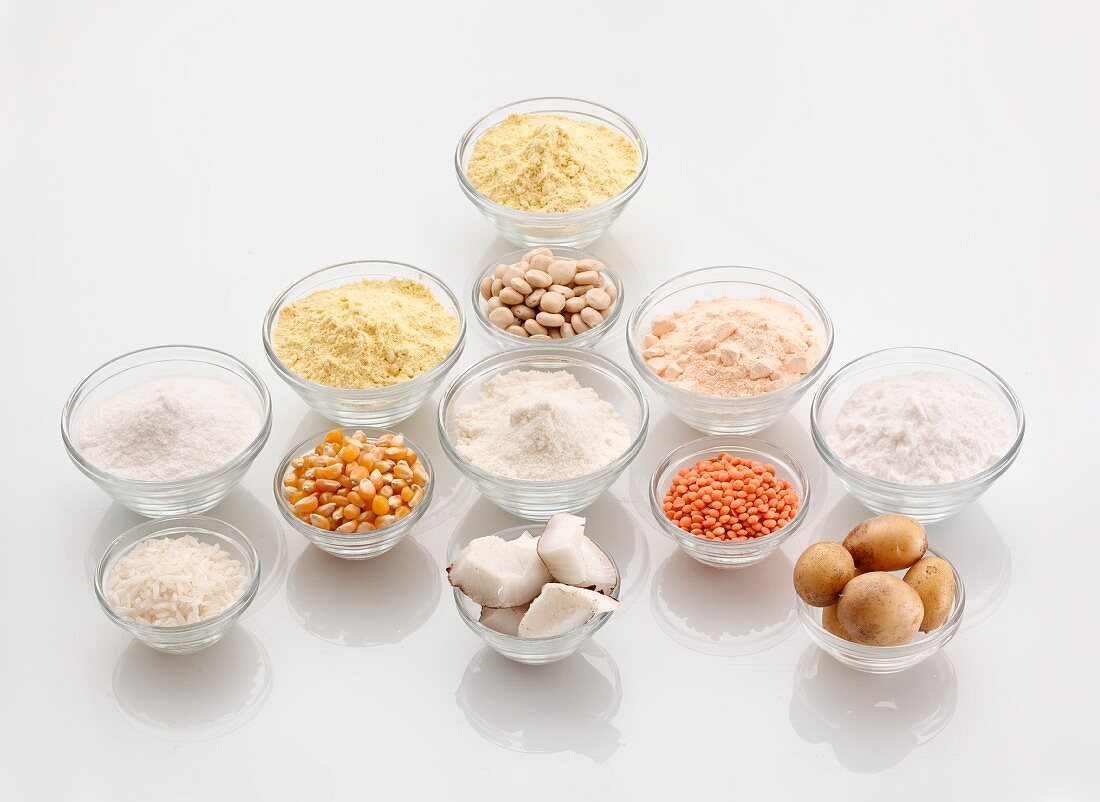 Assorted types of gluten-free flour in bowls