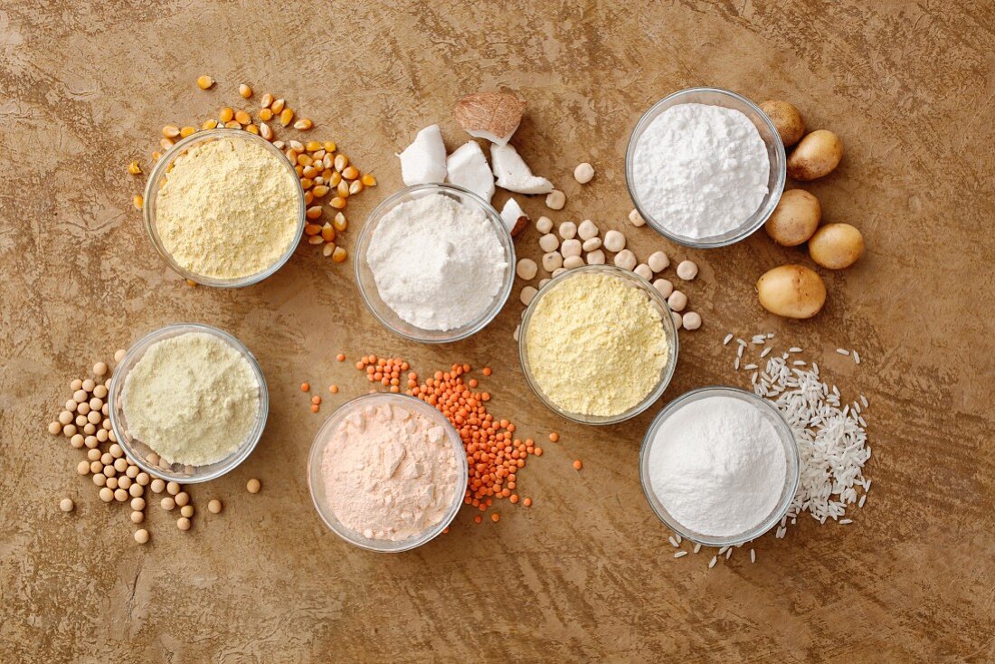Different types of gluten-free flour in bowls