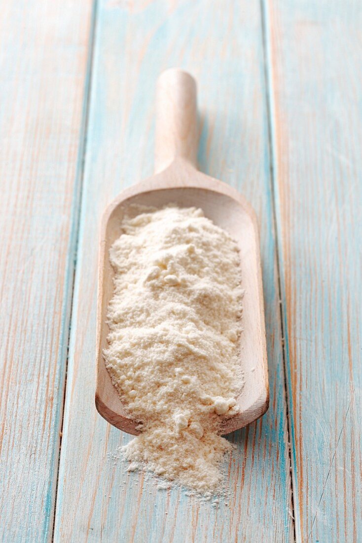 Coconut on a wooden scoop