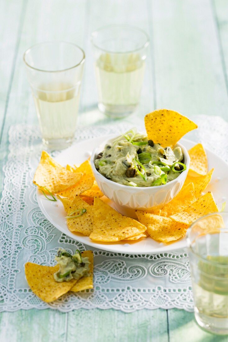 An avocado dip with tuna and capers