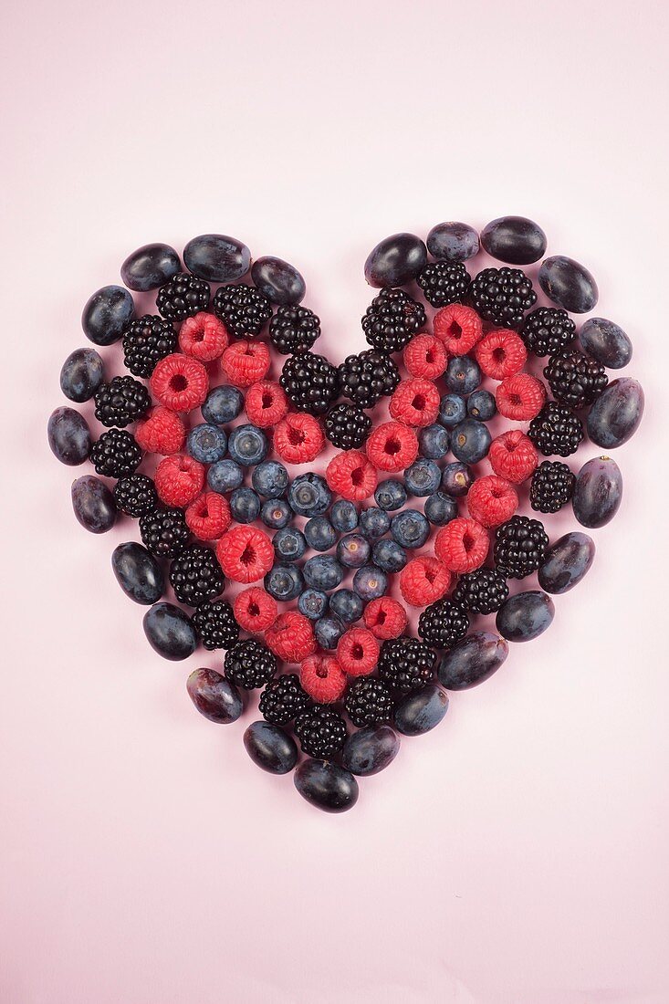 Fresh berries in heart shape,studio shot