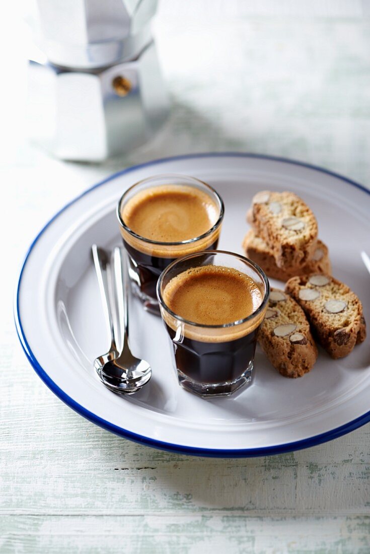 Two glasses of espresso with cantuccini