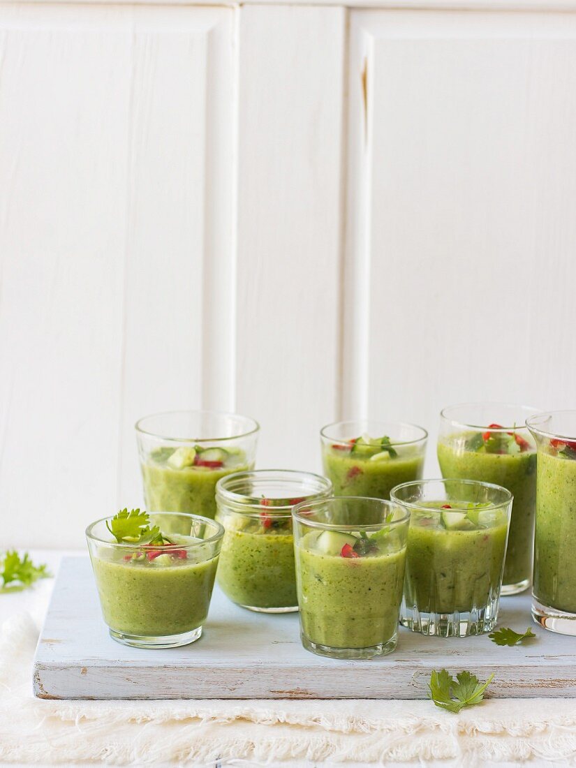 Green gazpacho with cucumber, celery, green peppers, red chilli peppers and coriander leaves
