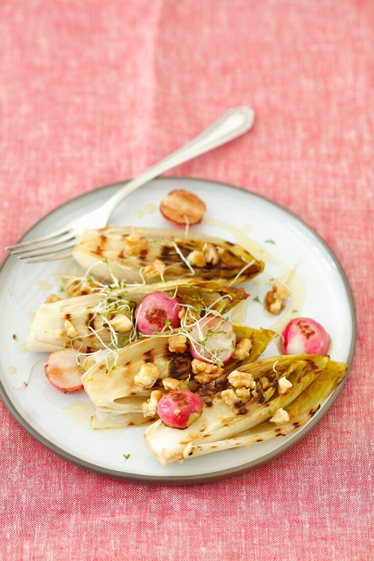 Grilled chicory and radishes with walnuts