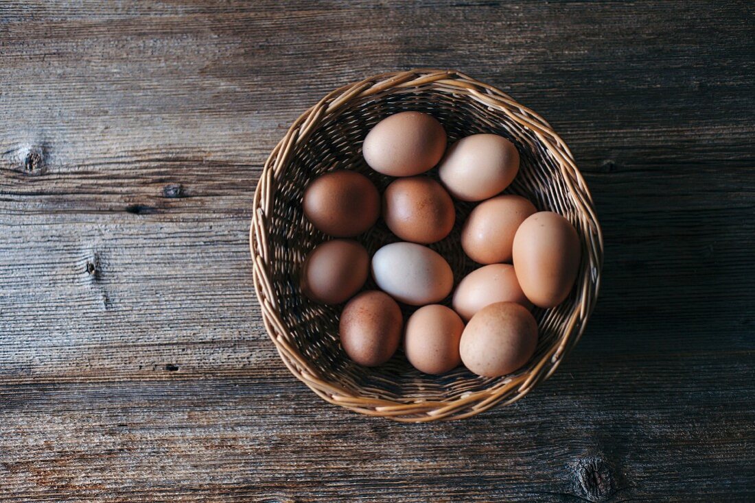 Organic eggs in a wicker basket