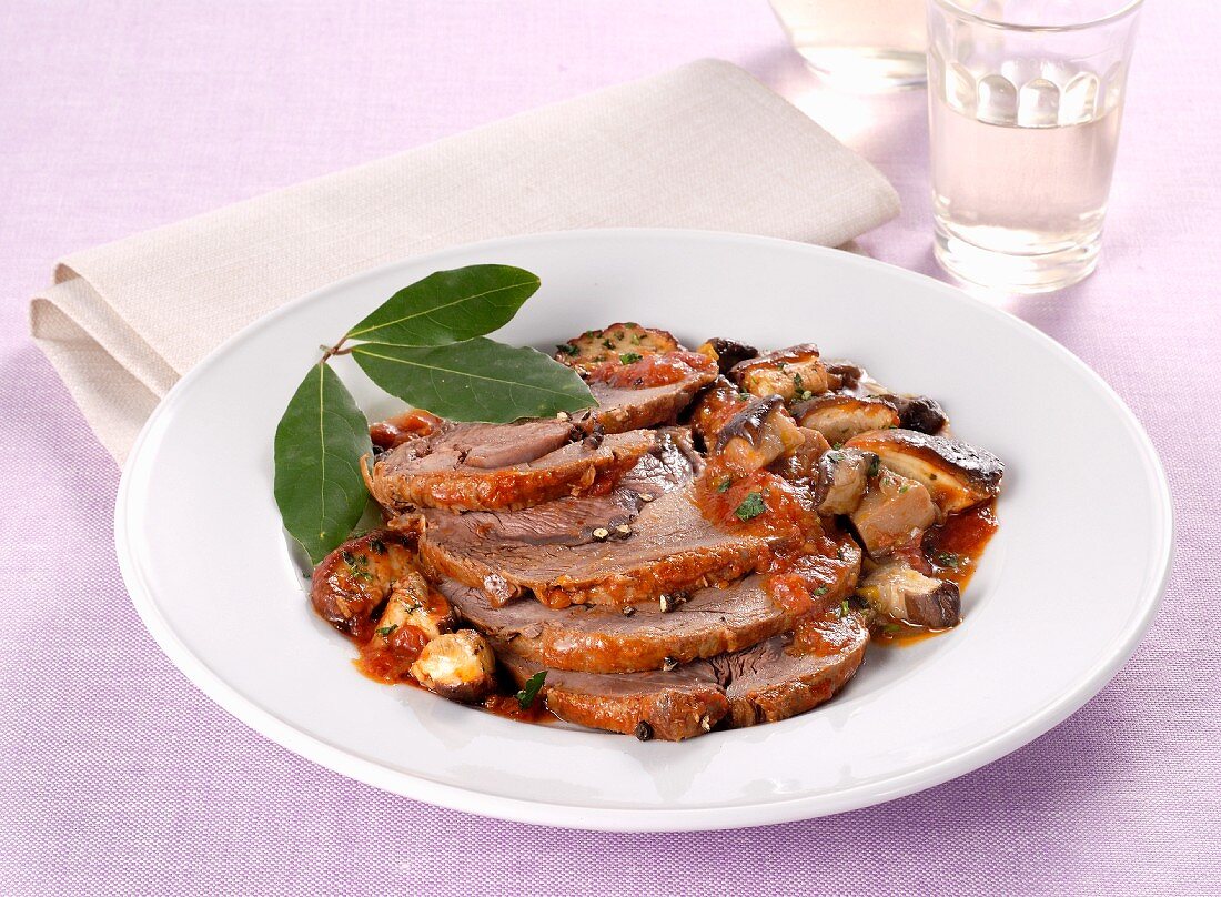 Sliced roast beef with porcini mushrooms