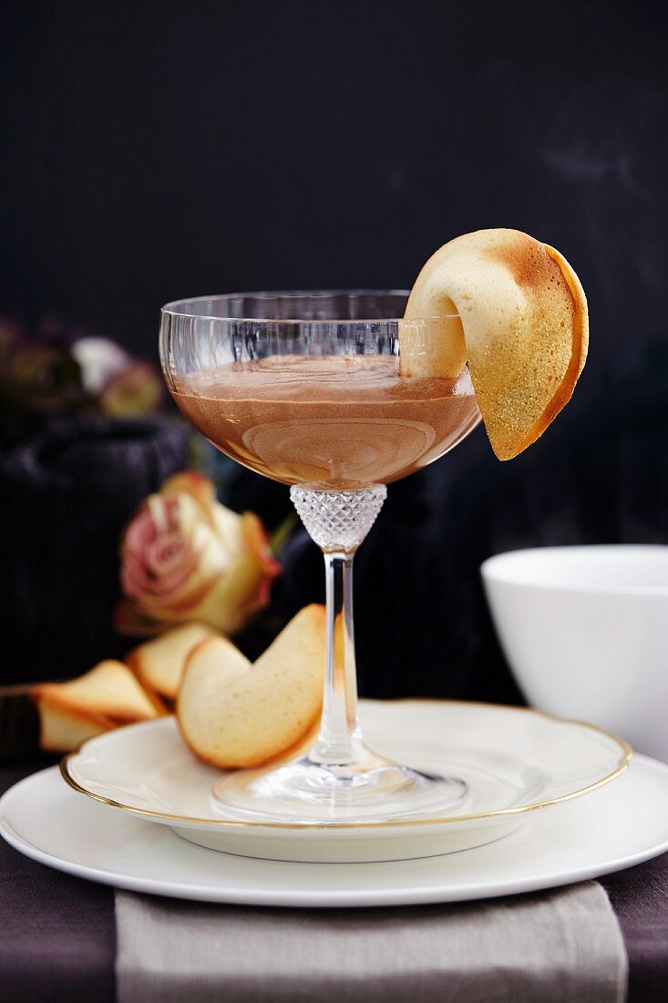 Chocolate mousse with fortune cookies for New Year