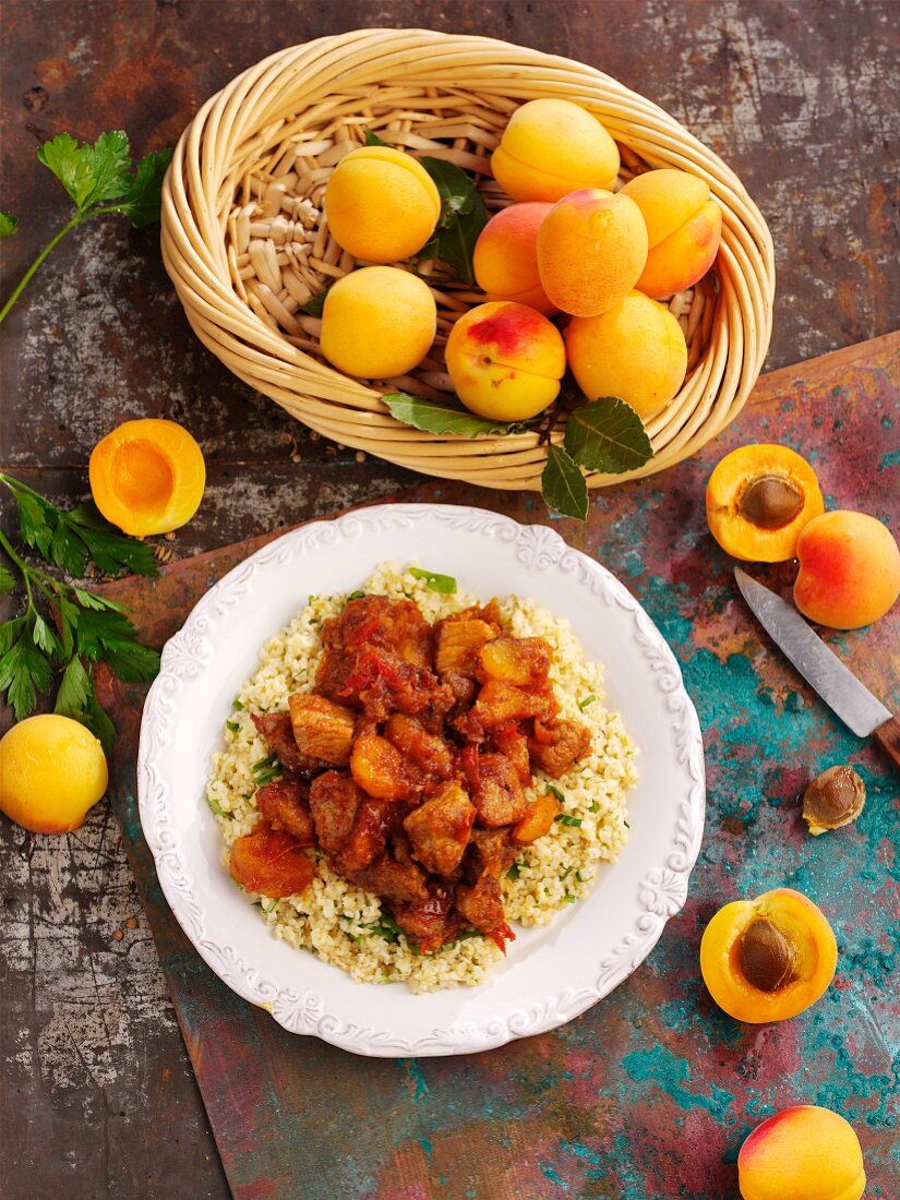 Pork with apricots and couscous (North Africa)