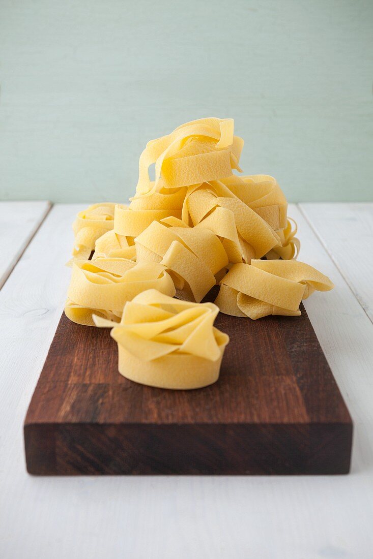 Pappardelle on a wooden board