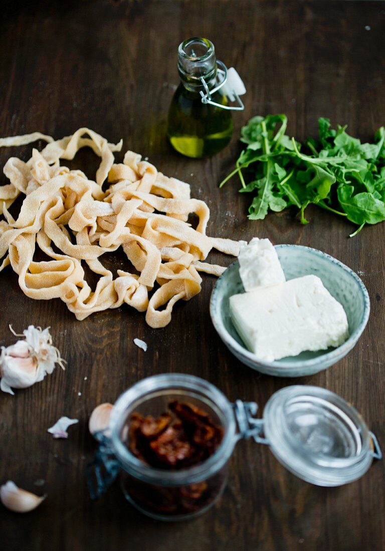 Ingredients for pasta with sundried tomatoes and feta cheese