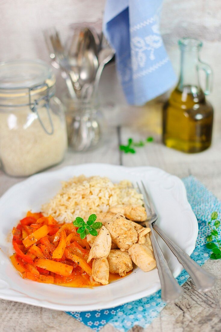 Paprika chicken with red and yellow peppers and Thai rice