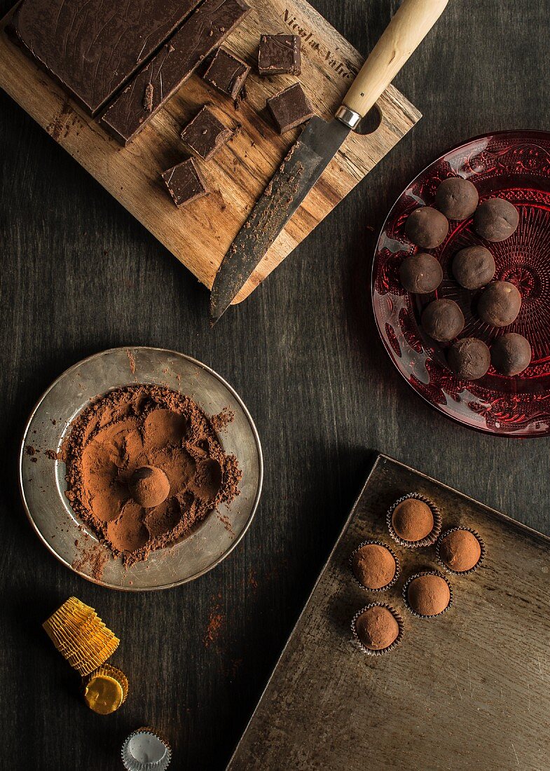 Chocolate truffles on a dark wood background