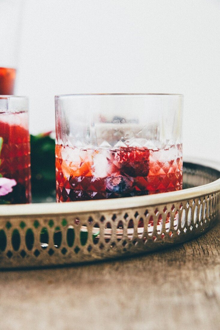 Berry drink with ice cubes