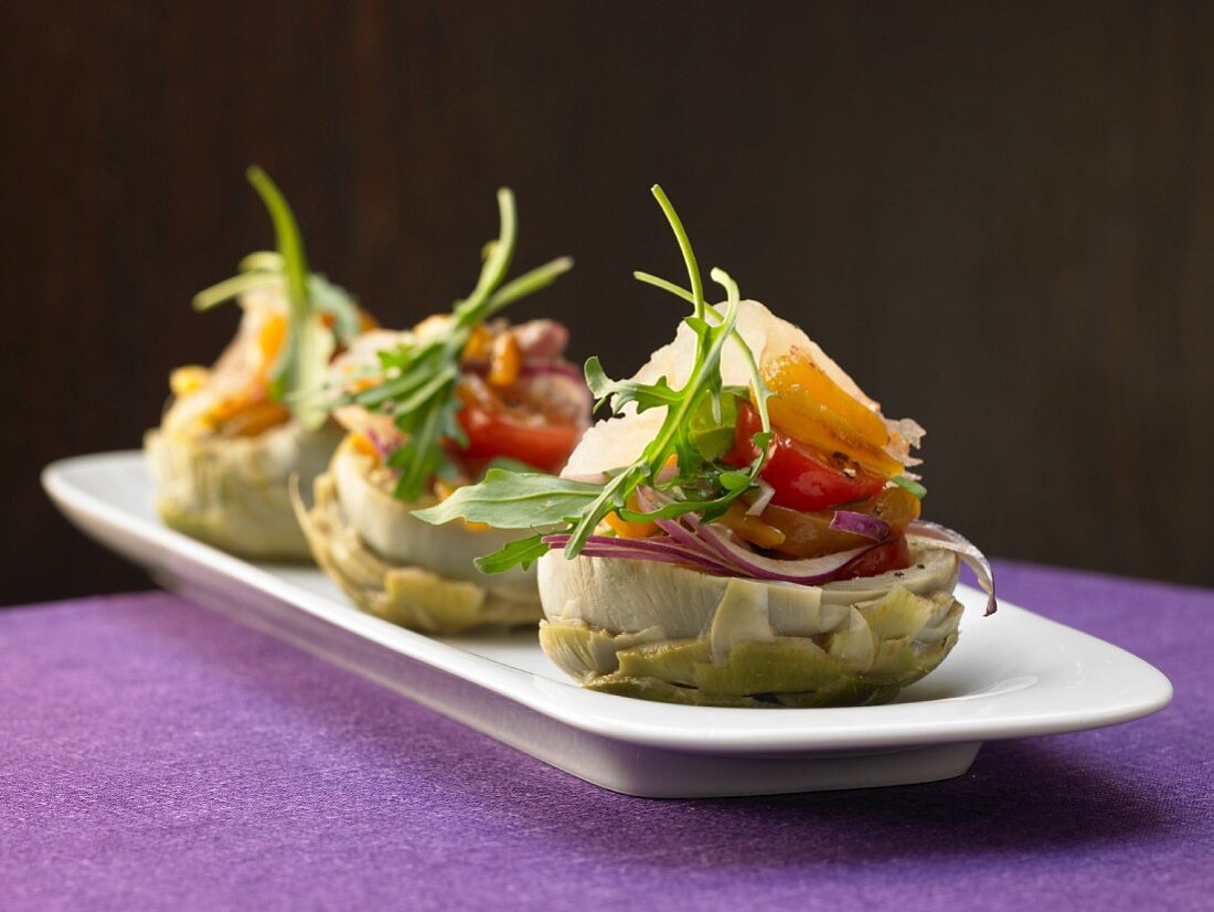 Artichoke bases with pickled seafood and salad