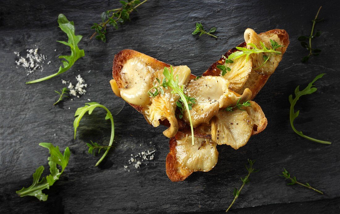 Yellow Oyster mushrooms sauteed in butter and served on sour dough toast with wild rocket