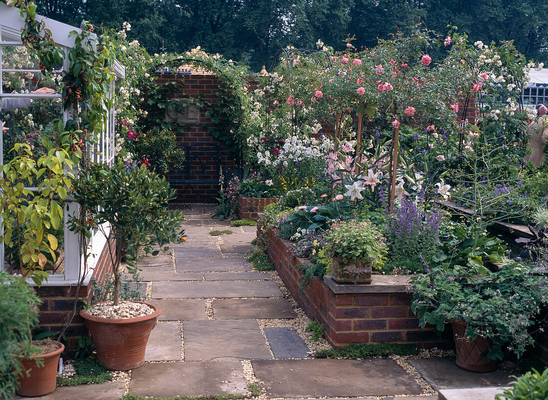 Garden with lean-to greenhouse