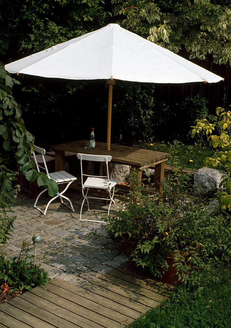 Seat with white parasol