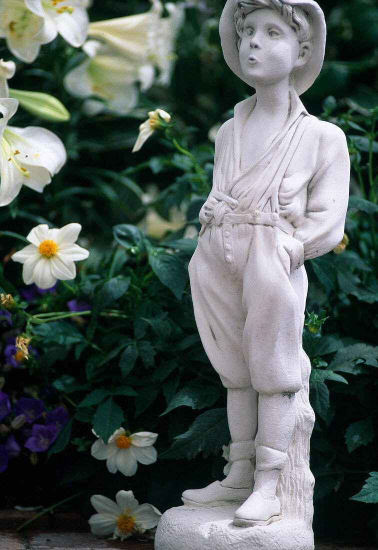 Whistling boy in cement