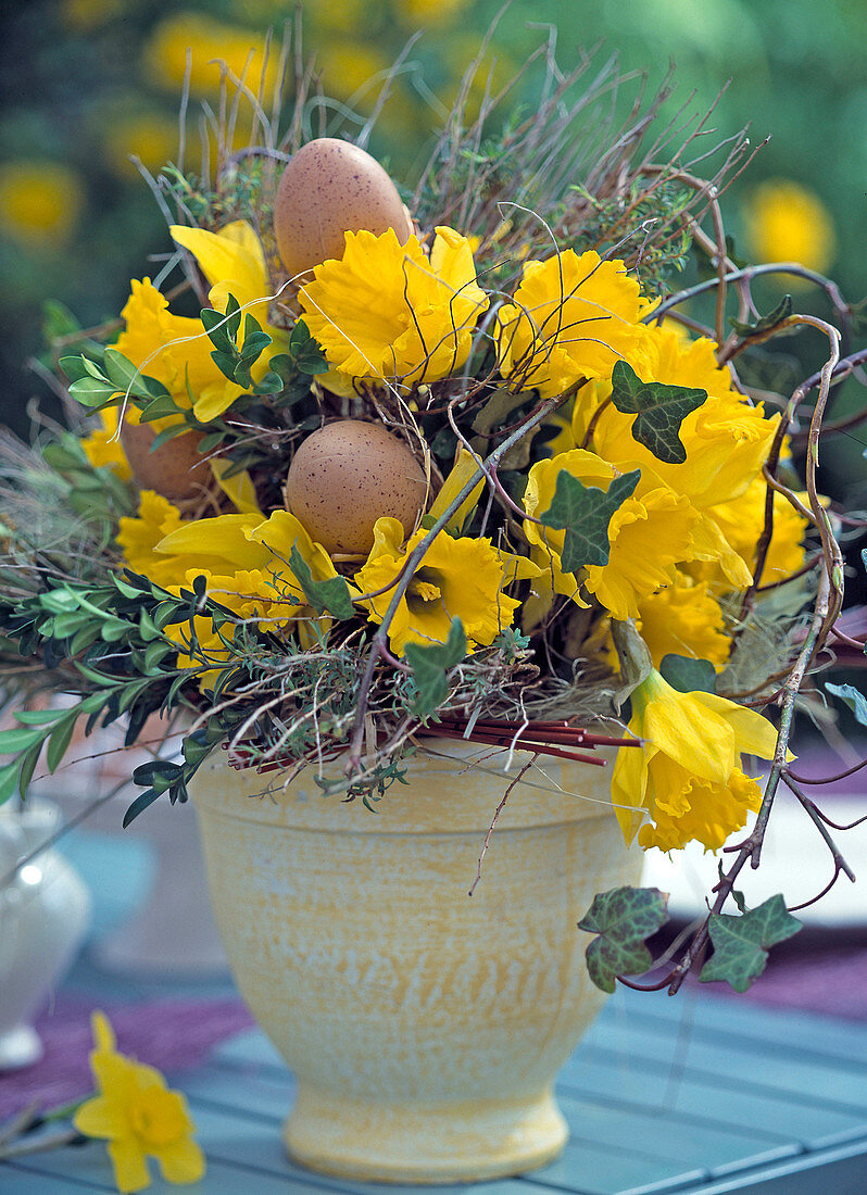 Easter bouquet with daffodils and twigs