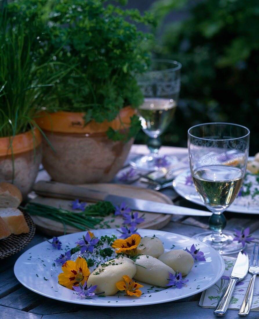 Boiled potatoes and herb quark, chives and parsley