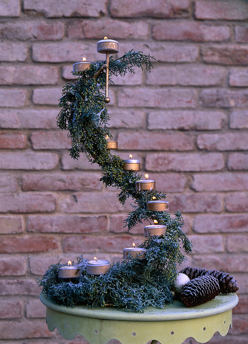 Hoarfrost on tea light holder with Cupressus arizonica (Arizona Cypress)