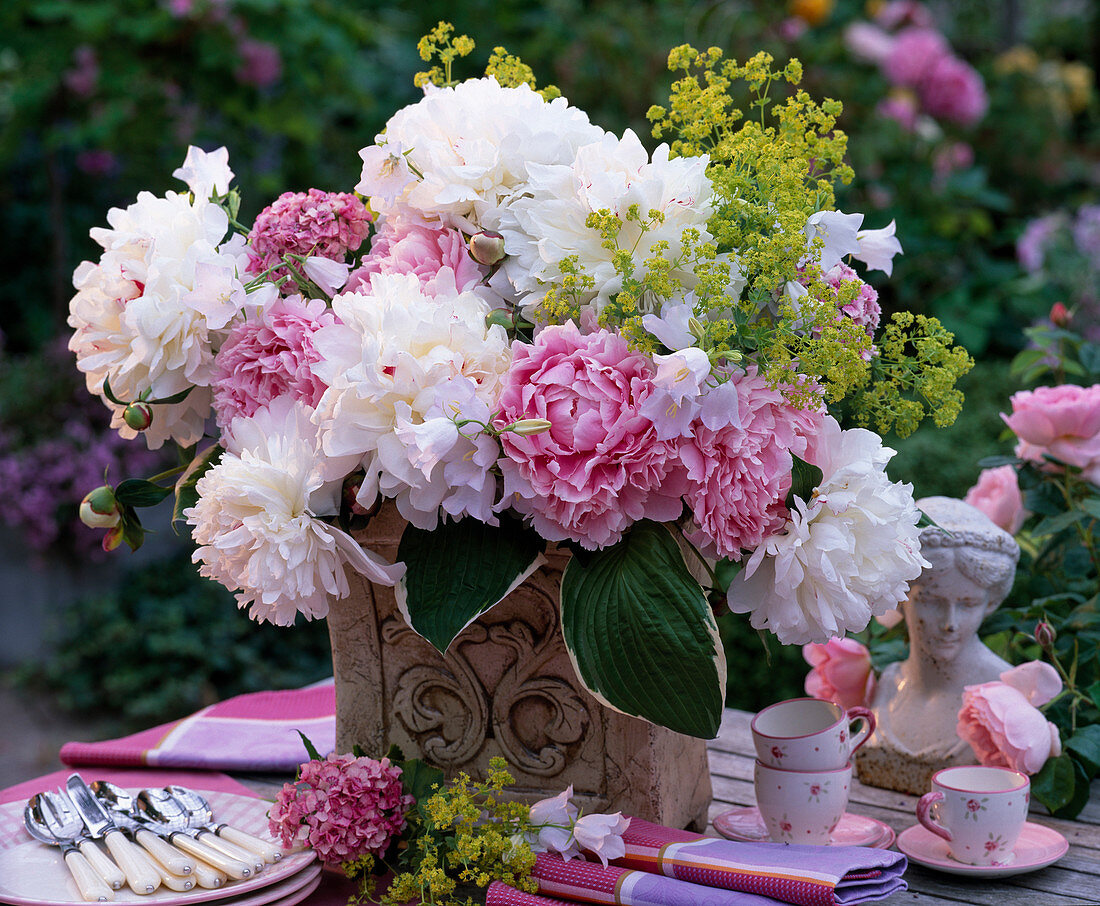 Paeonia (peonies), Alchemilla (lady's mantle), Hosta (funcias)