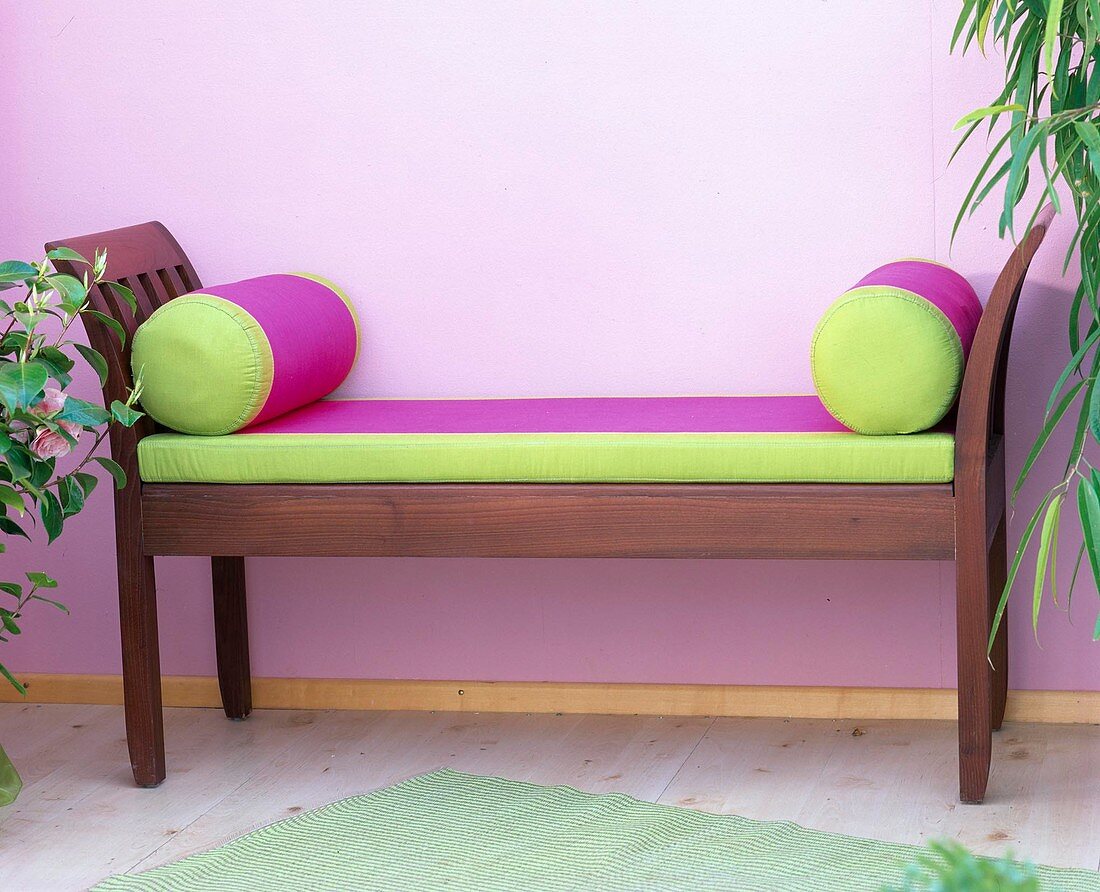 Bench with cushion and arm rolls