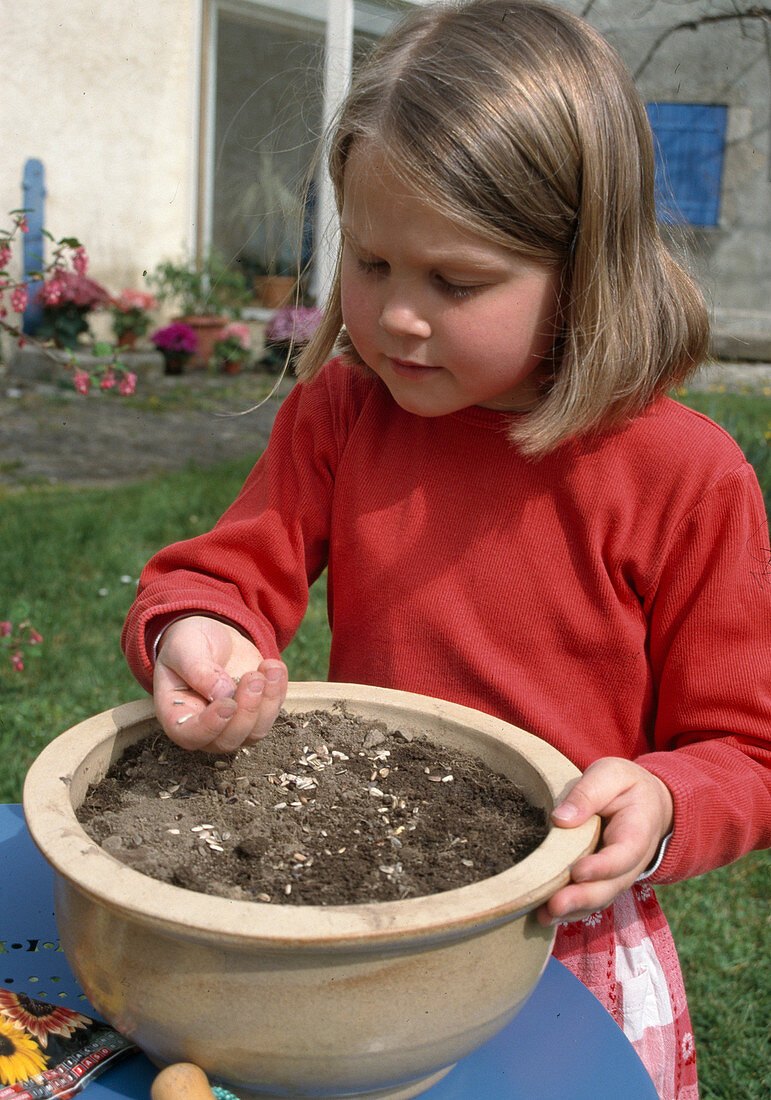 Child sowing seeds