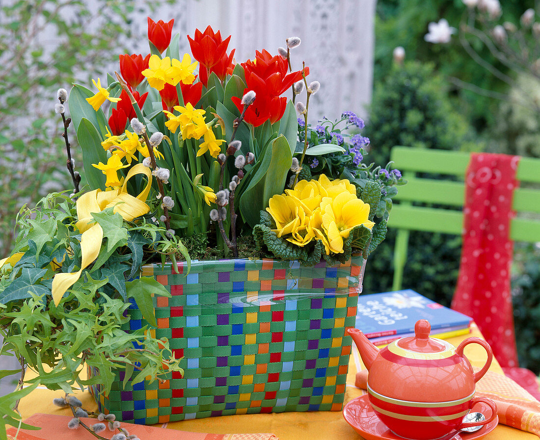 Planting a colourful wicker basket