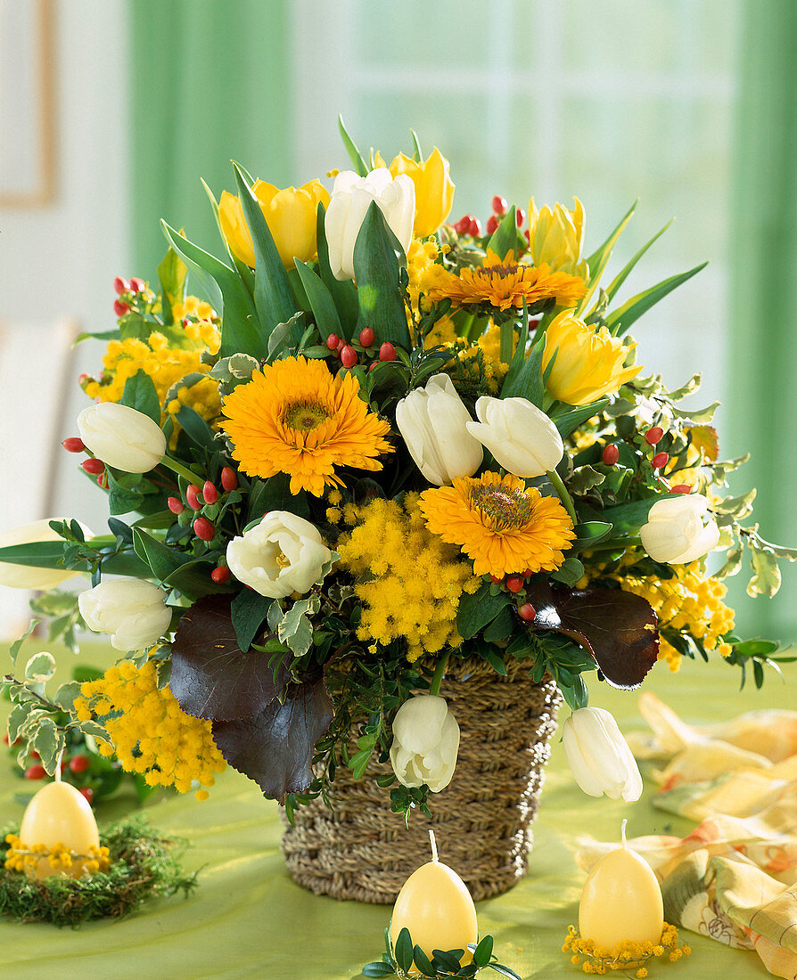 Easter bouquet with marigolds, mimosa and tulips