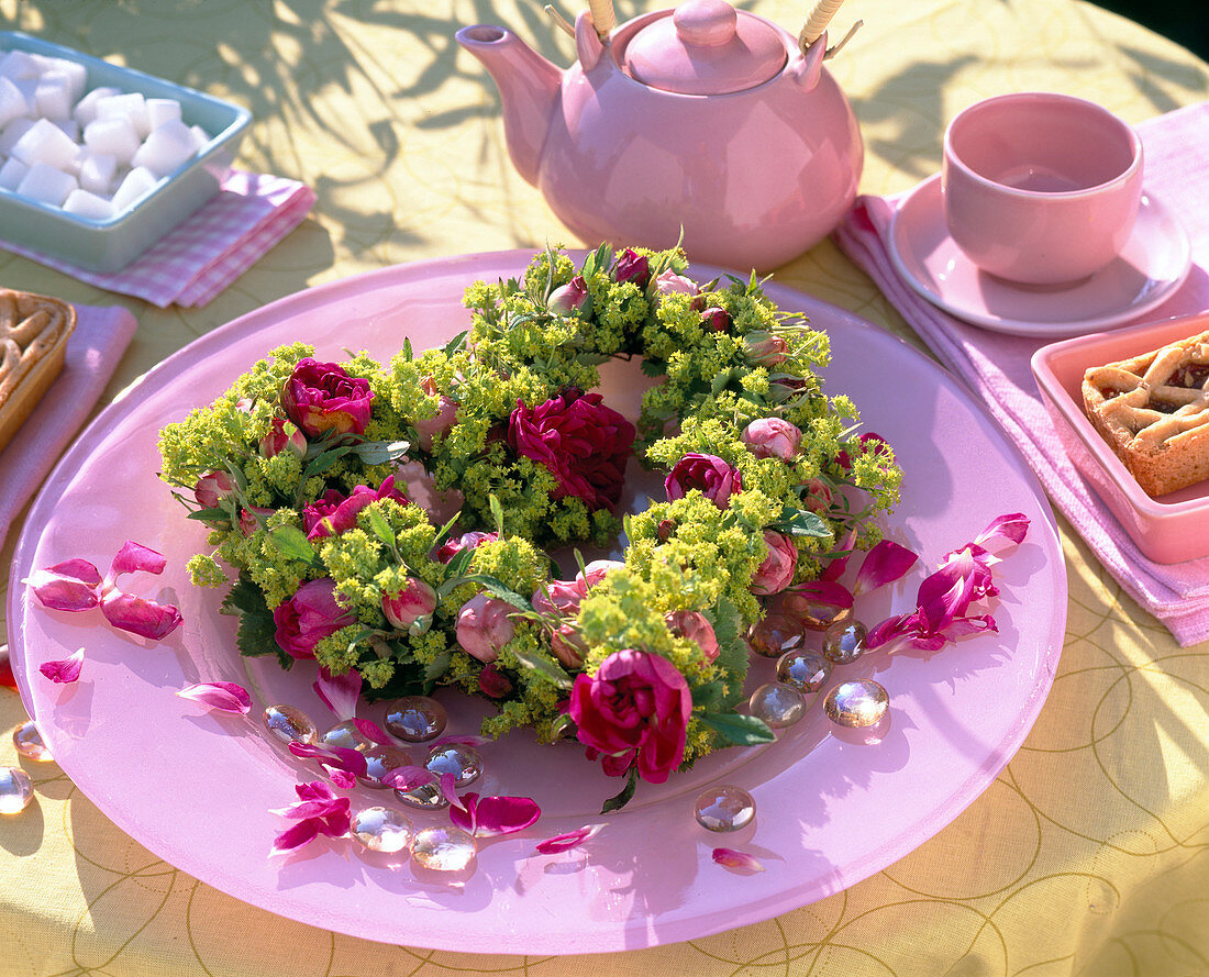 Heart of pink (roses) and alchemilla (lady's mantle)