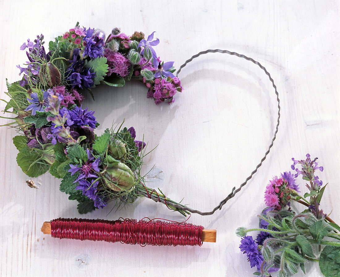 Heart made of blue and pink flowers