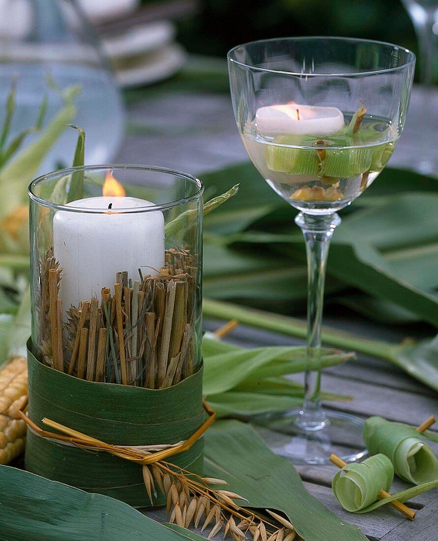 Lantern in a glass and floating candle