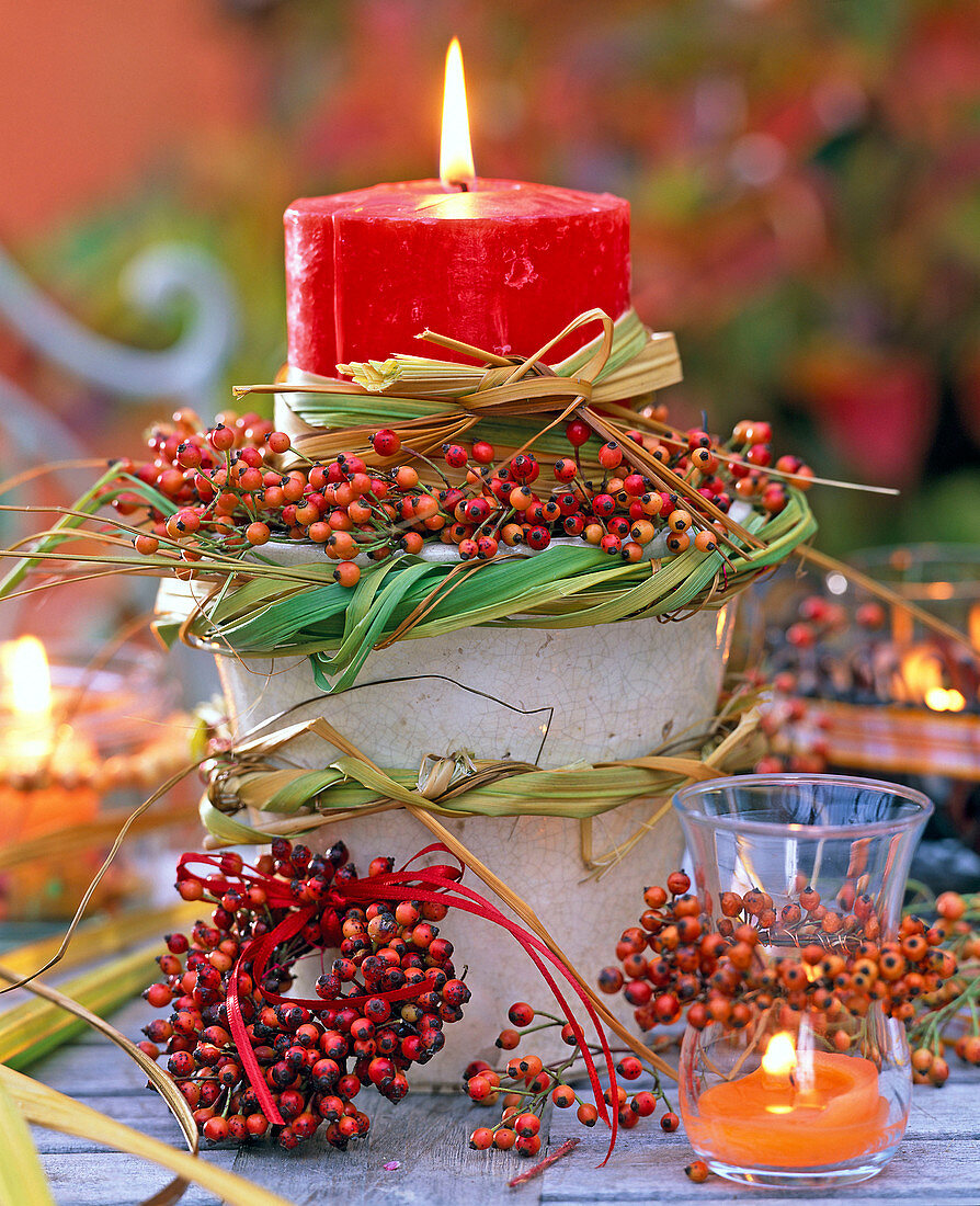 Candle arrangement with wreaths of Rosa (rosehip)