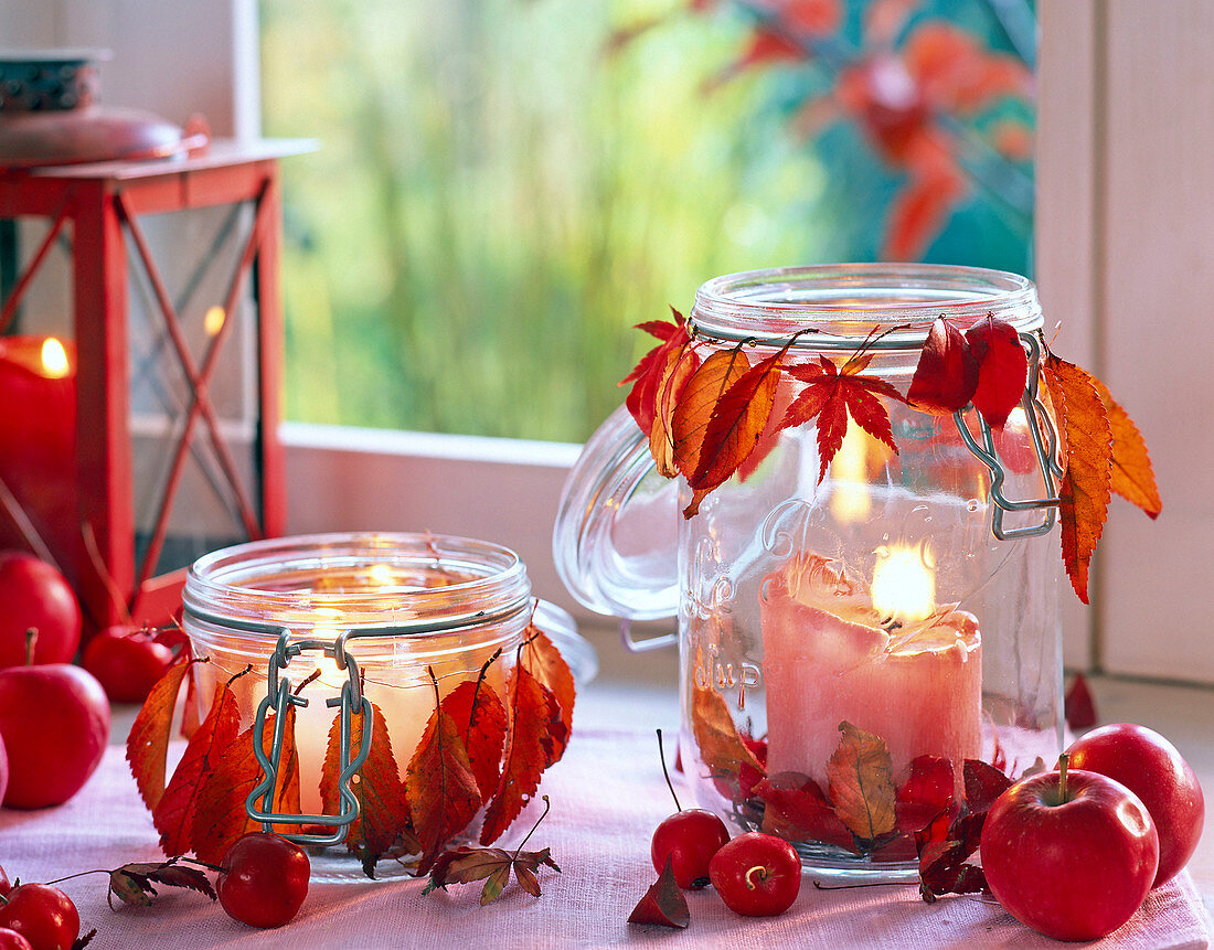 Lanterns decorated with wreath of leaves, malus