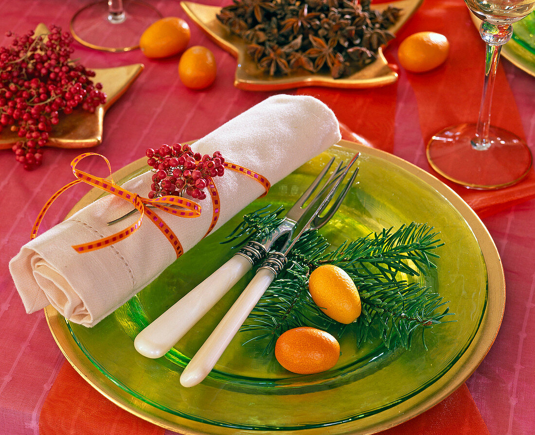 Plate decoration with a cream-colored napkin with branch