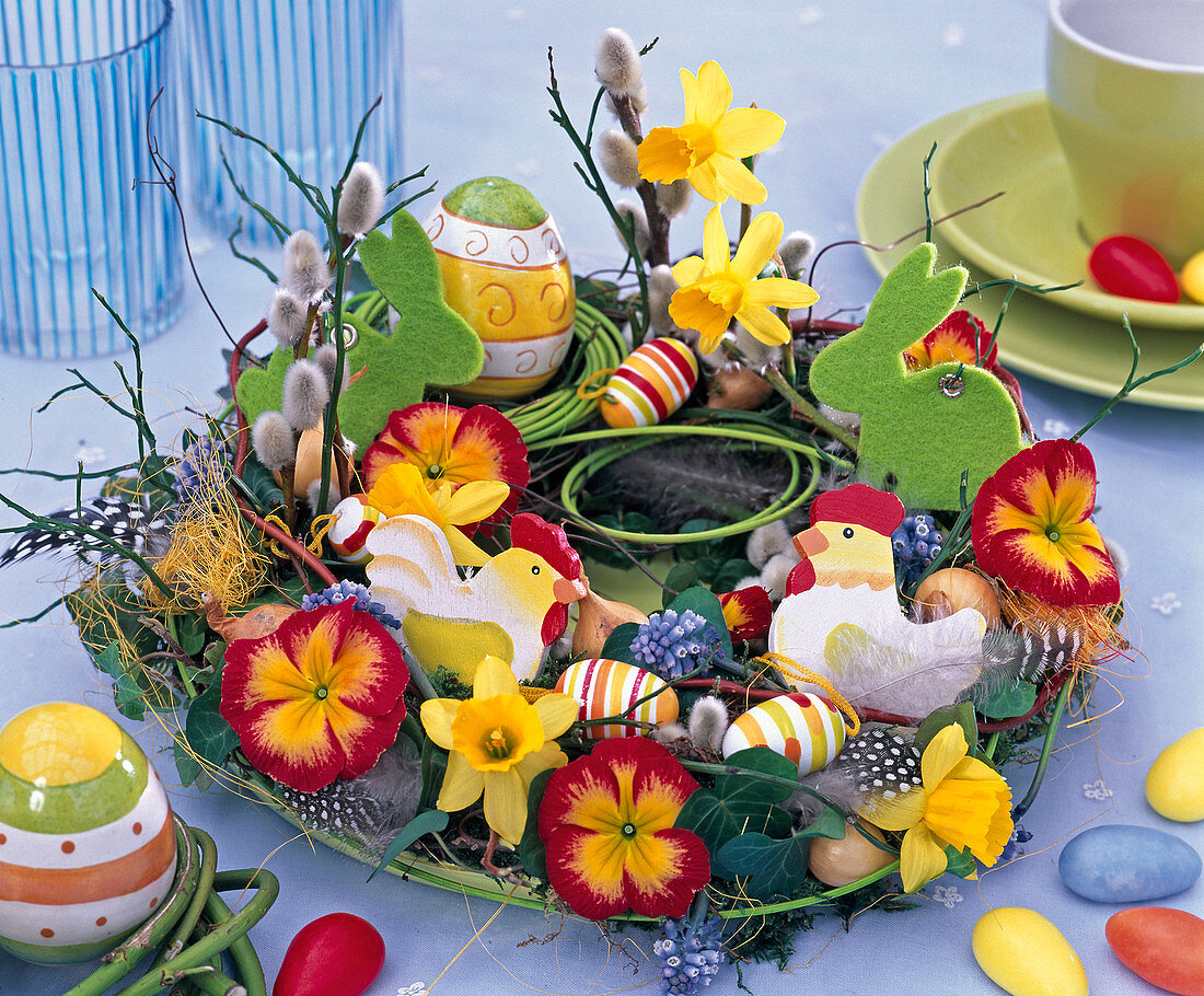 Colourful plate wreath as an Easter table decoration