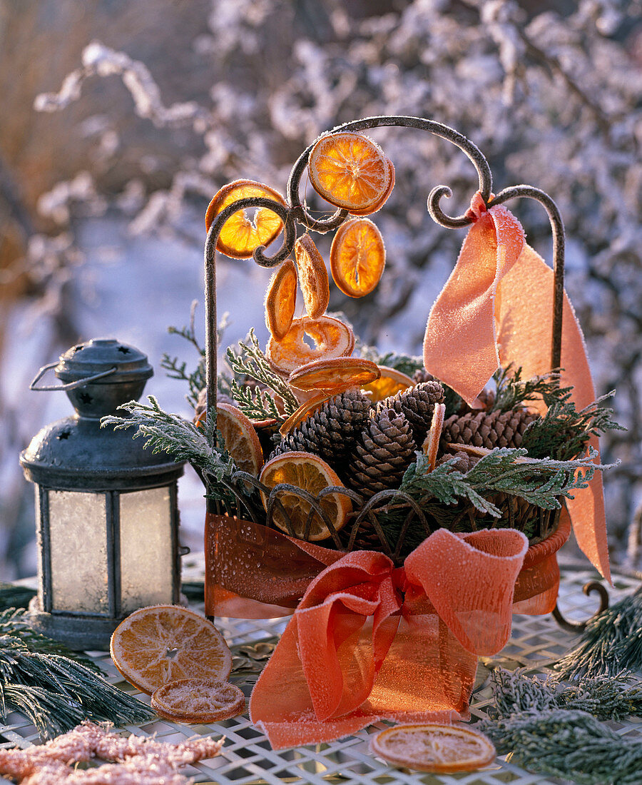 Basket with cones, dried slices of citrus