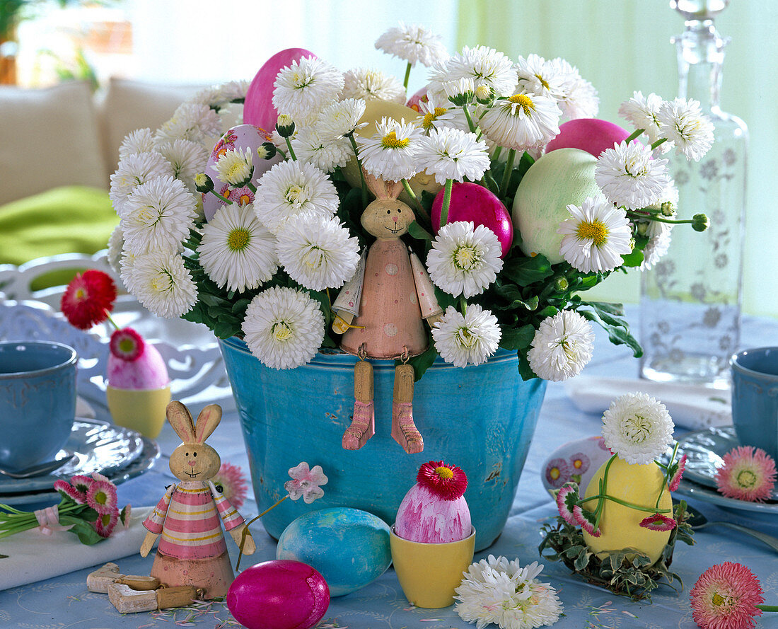 Bellis perennis with Easter eggs, rabbits, flowers